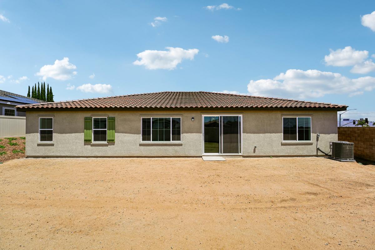 Representative builder view of the rear yard and exterior